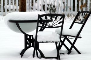 outdoor table and chairs in snow